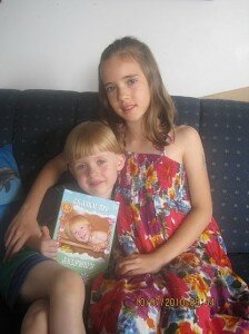 Андрюша с подарком и его сестричка Маша